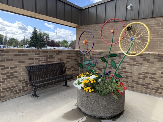 metal flowers outside library